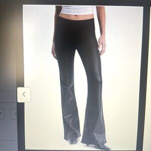 Mid rise black coated pull on 70’s flare jeans 
Express brand
Brand new!